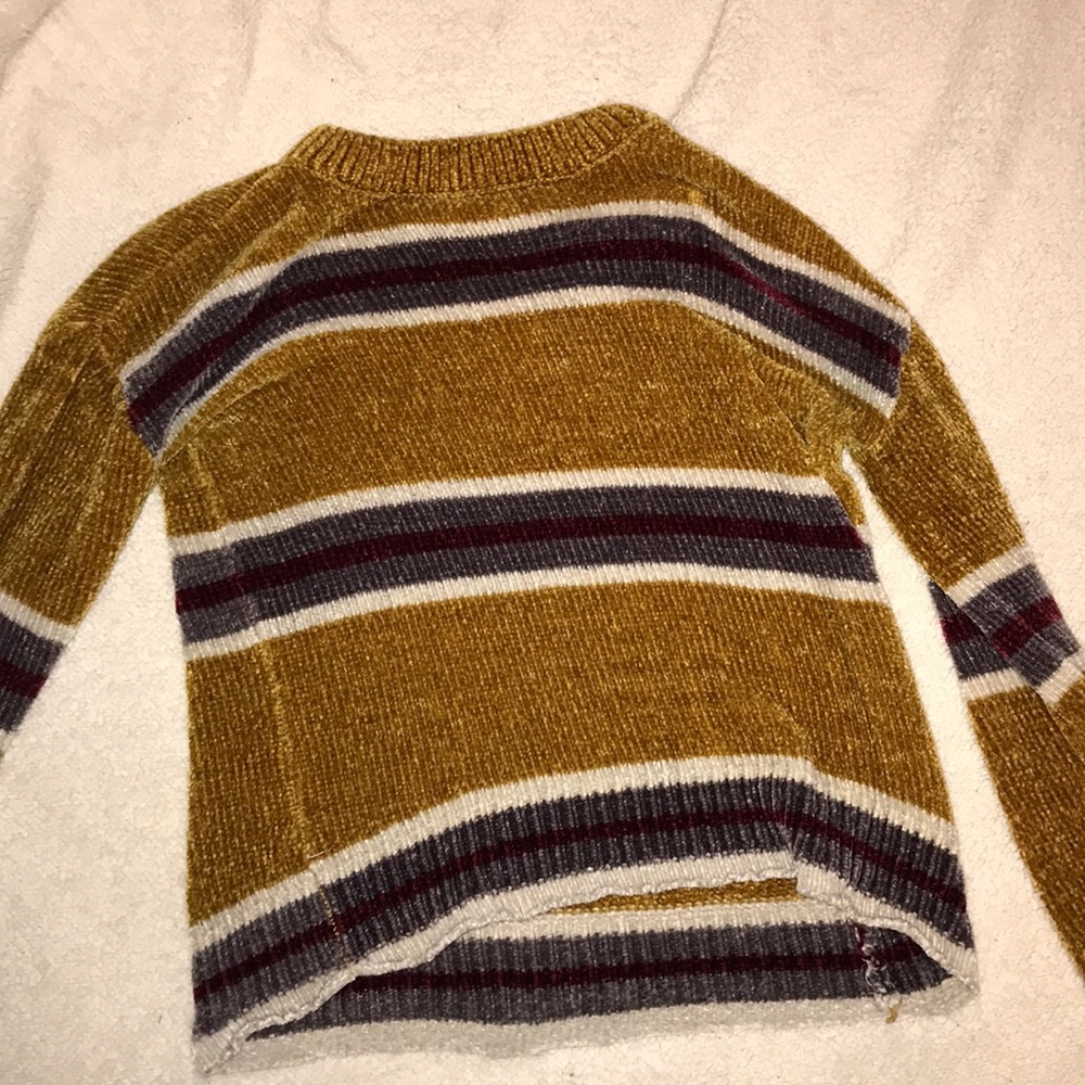 yellow, red, grey and white sweater